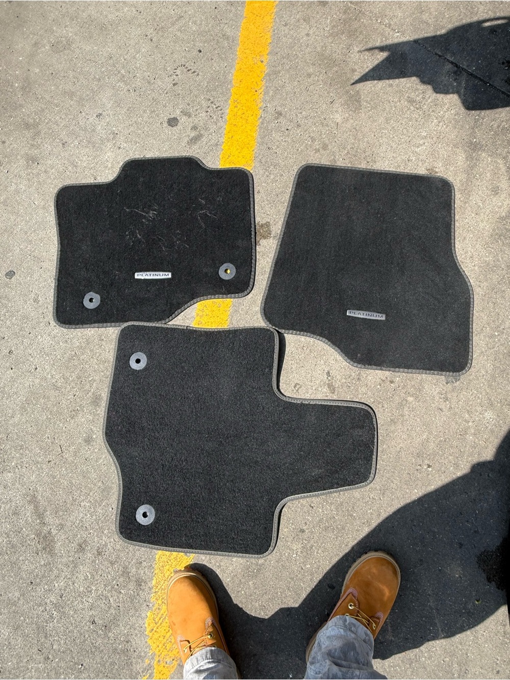 OEM Ford / FoMoCo Platinum black carpet floor mat set.